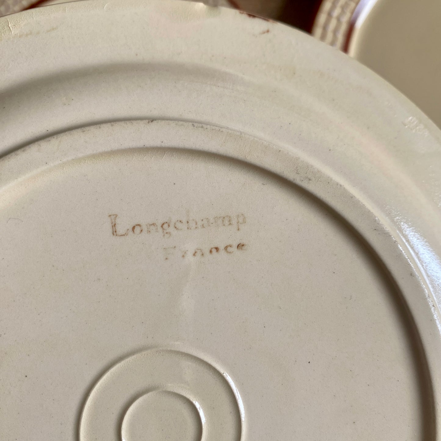 Lot de 4 assiettes à dessert vintage de la manufacture de Longchamp