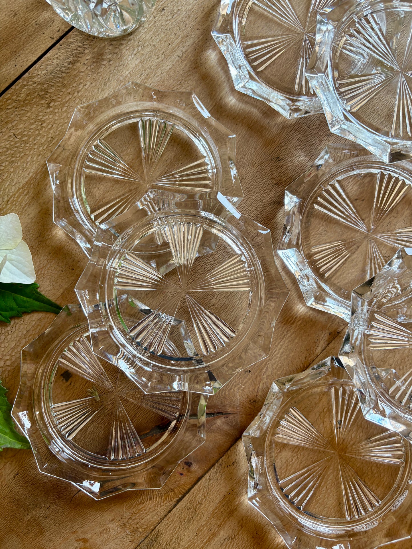 Lot de 11 dessous de verre vintage en verre