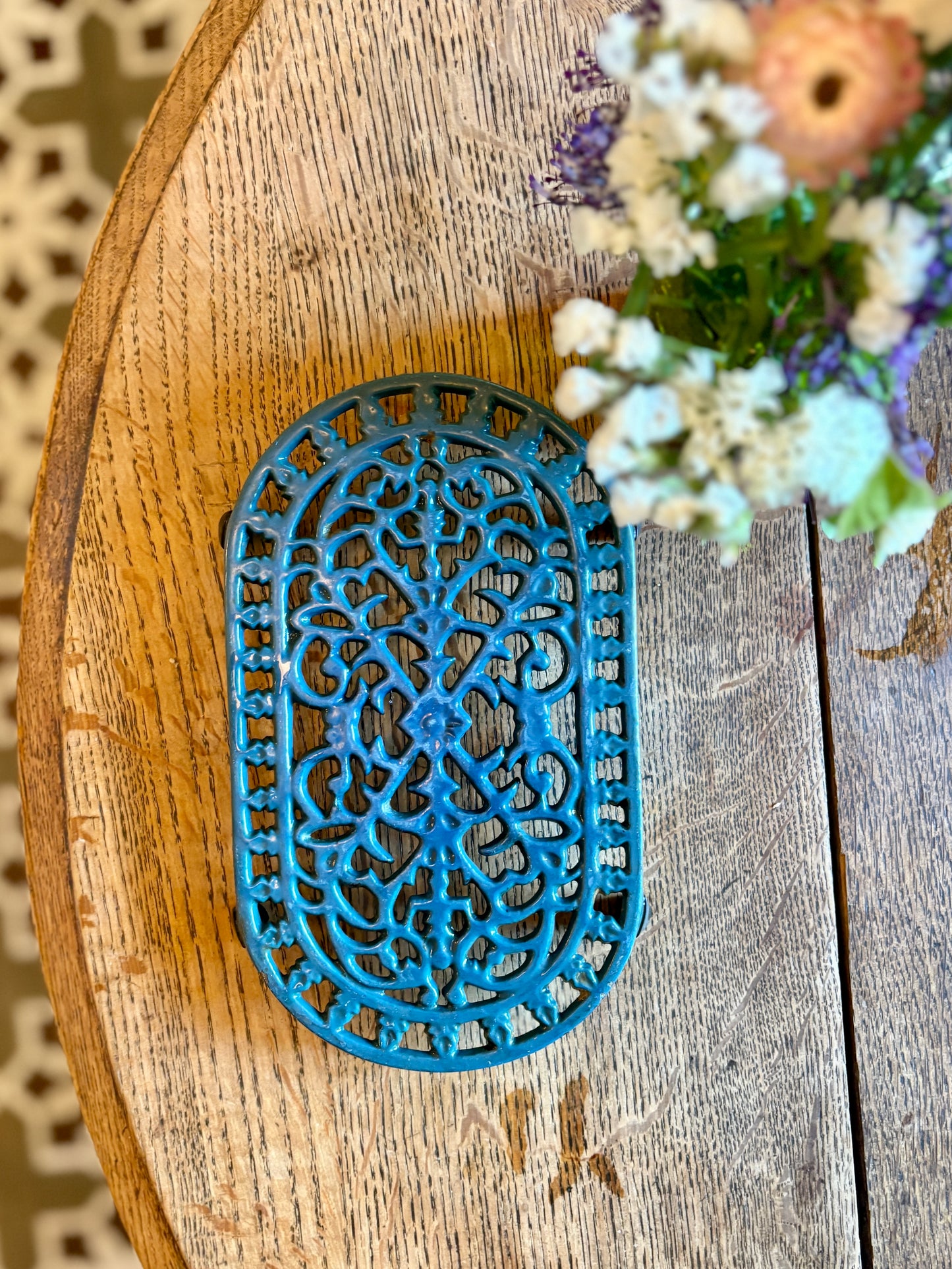 Dessous de plat vintage en fonte bleu