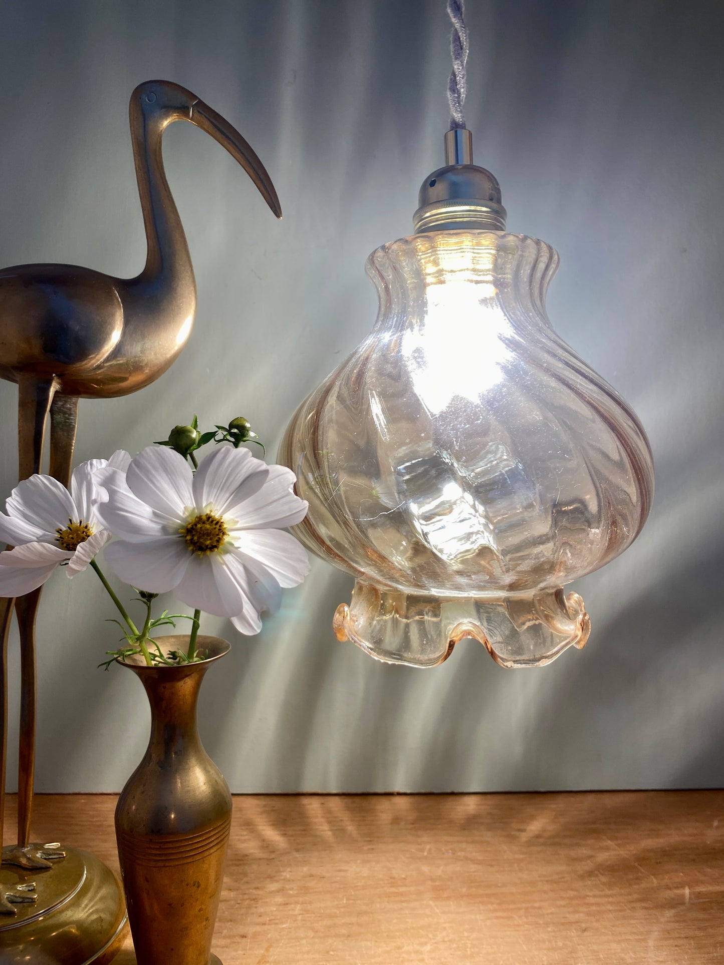 Suspension globe vintage en verre ambré