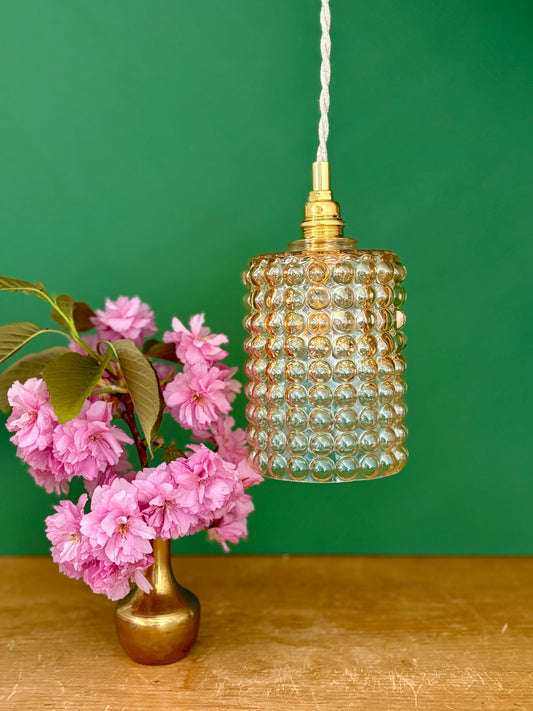 Suspension globe vintage en verre ambré bullé