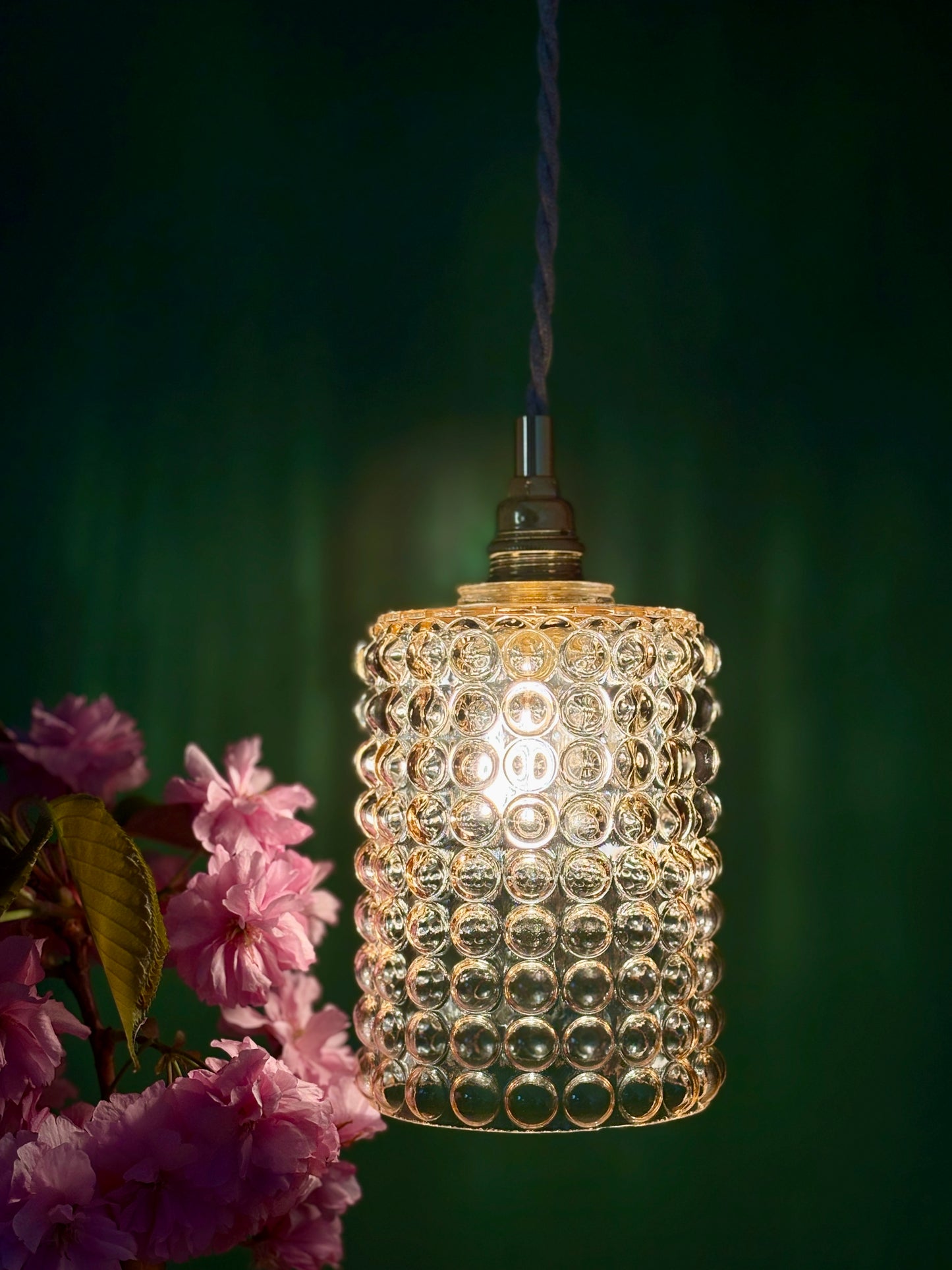 Suspension globe vintage en verre ambré bullé