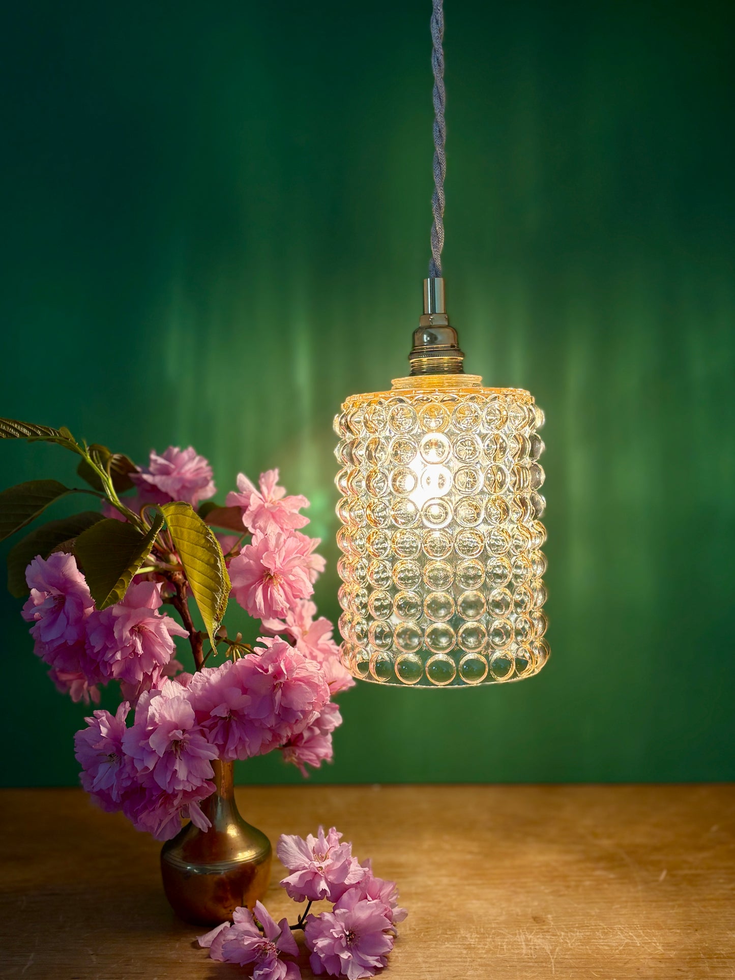 Suspension globe vintage en verre ambré bullé