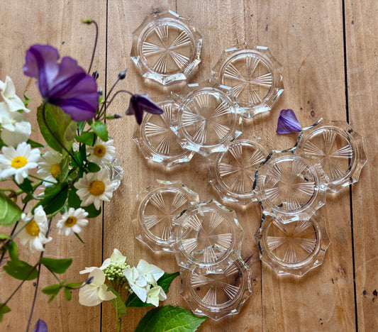 Lot de 11 dessous de verre vintage en verre