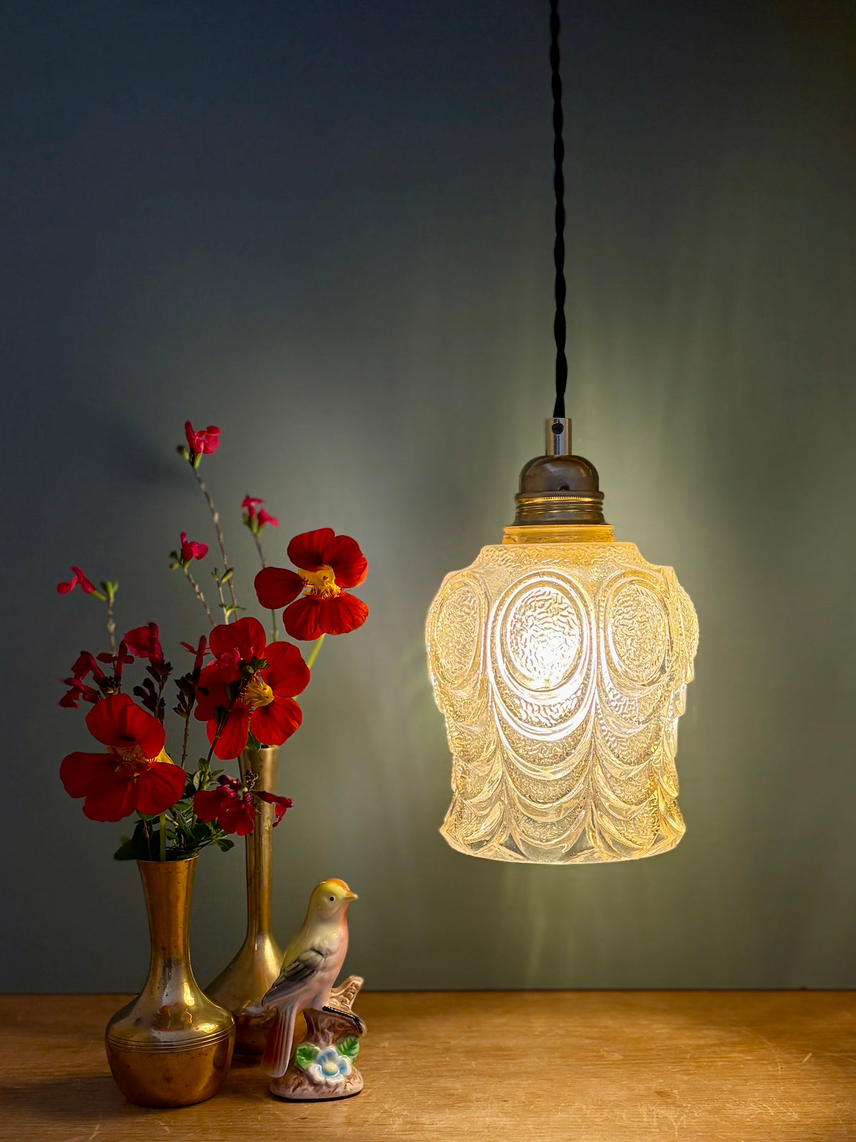 Suspension globe vintage en verre ambré (PDS)