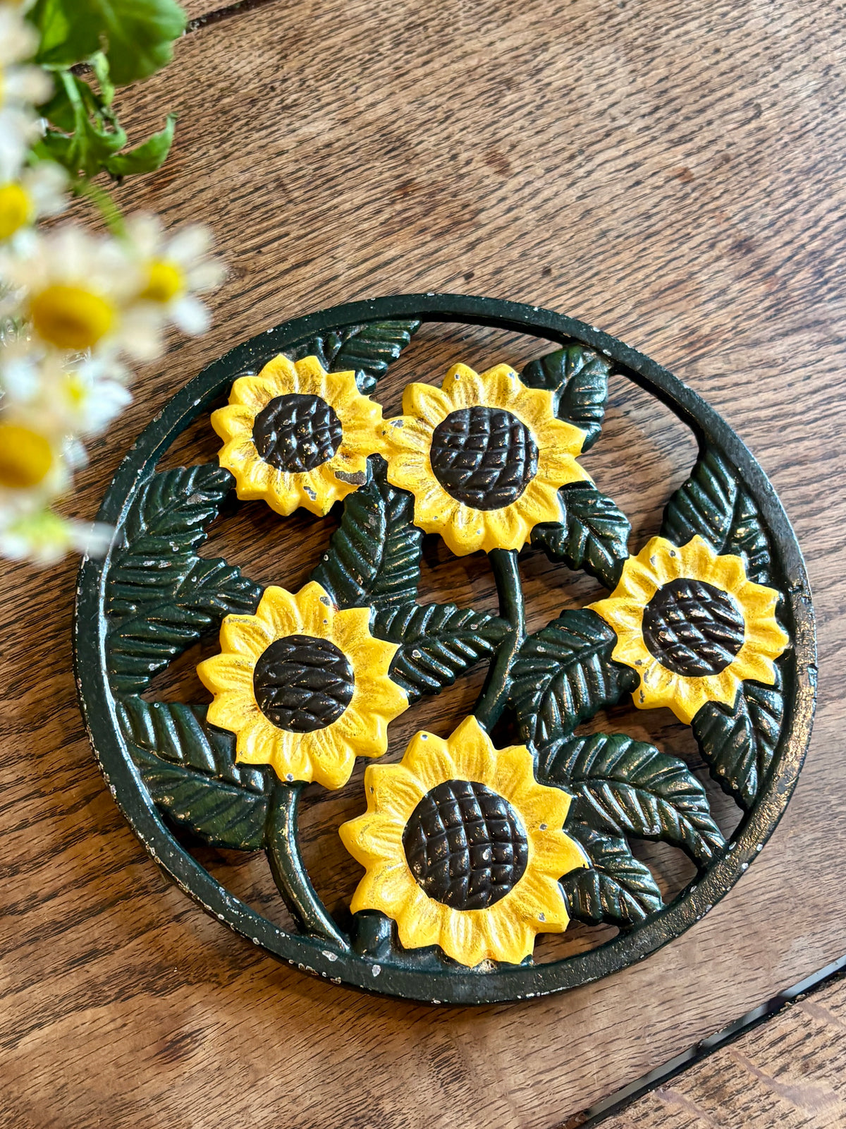 Dessous de plat vintage en fonte tournesol