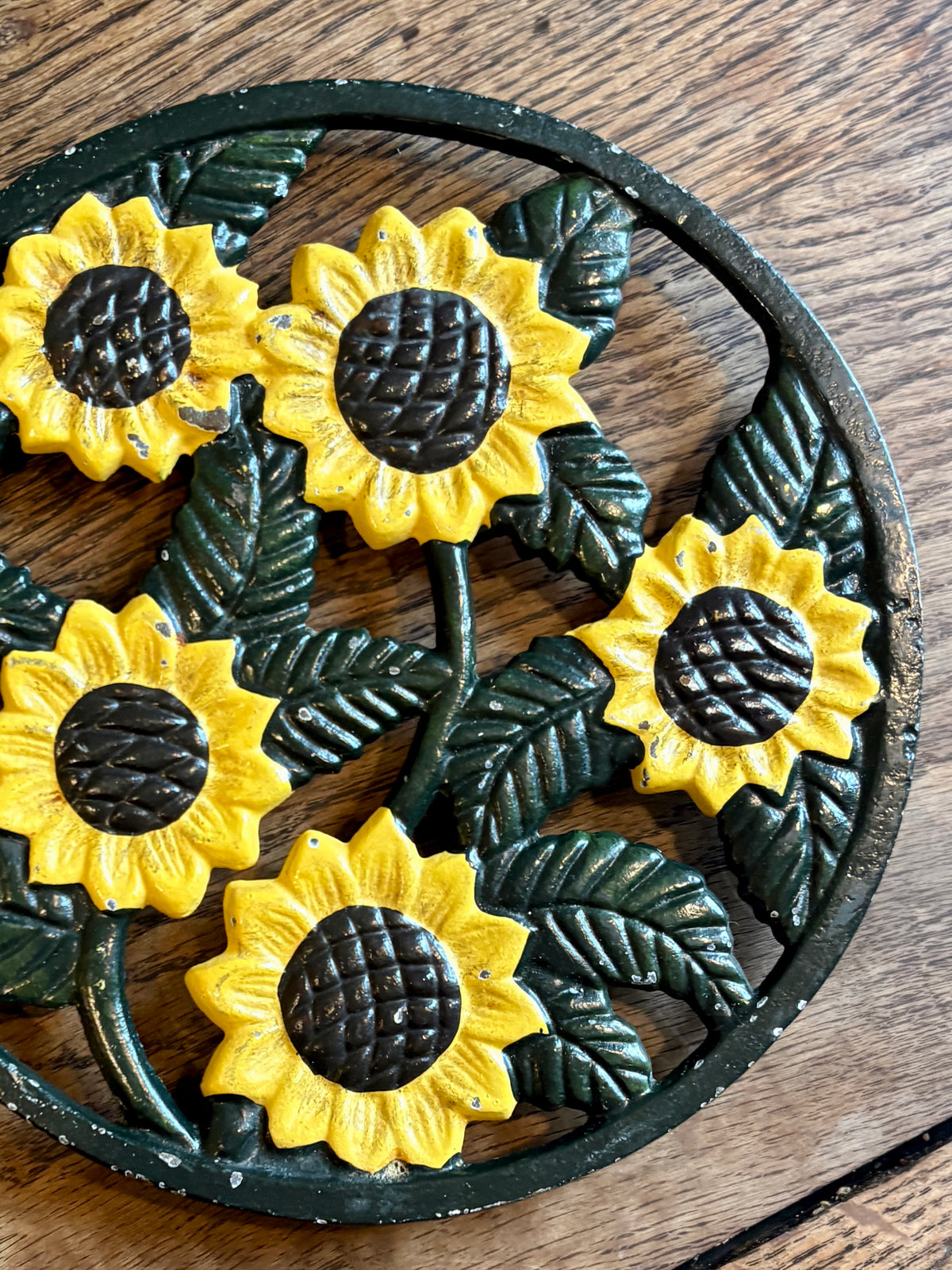 Dessous de plat vintage en fonte tournesol