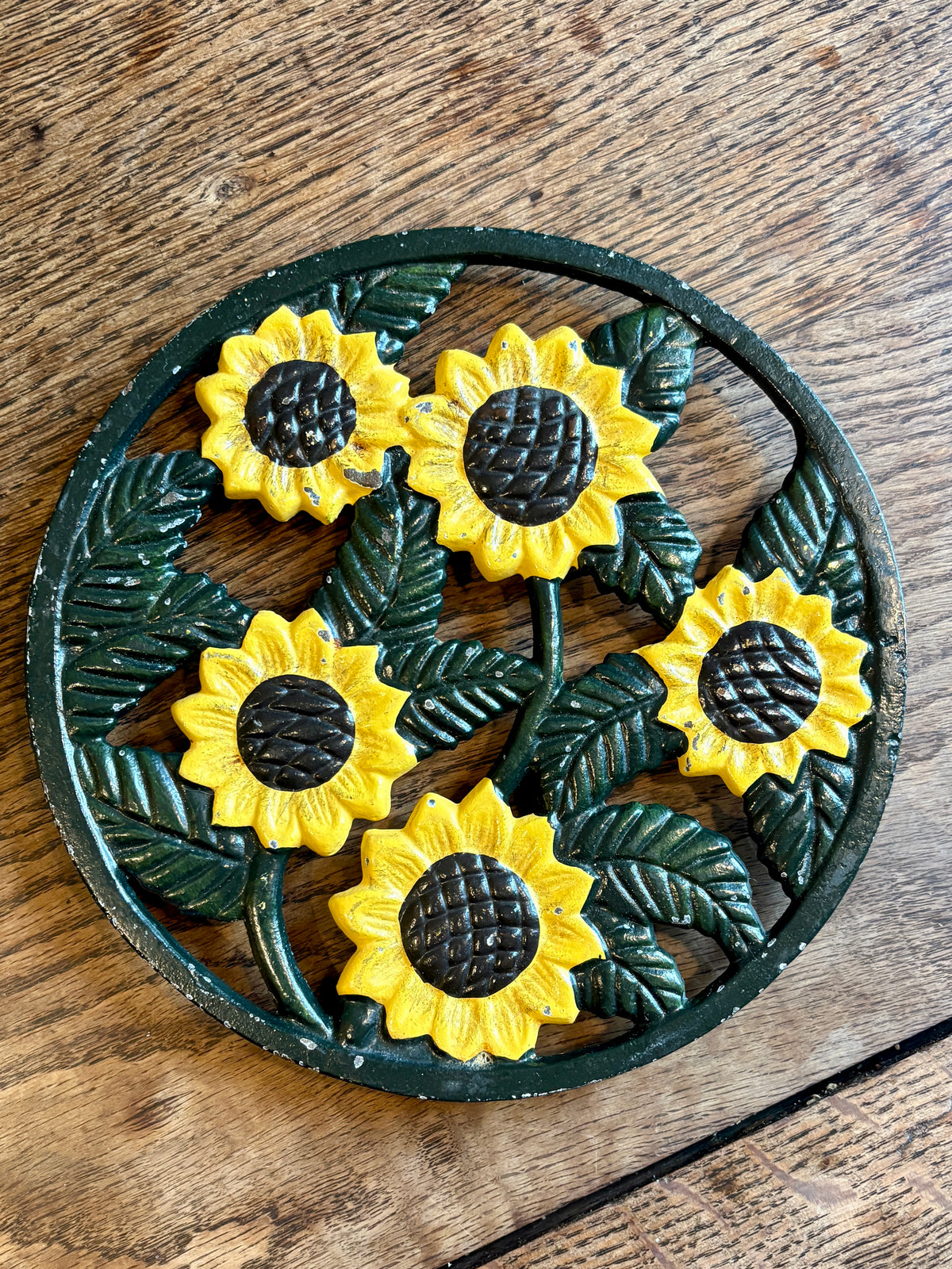 Dessous de plat vintage en fonte tournesol