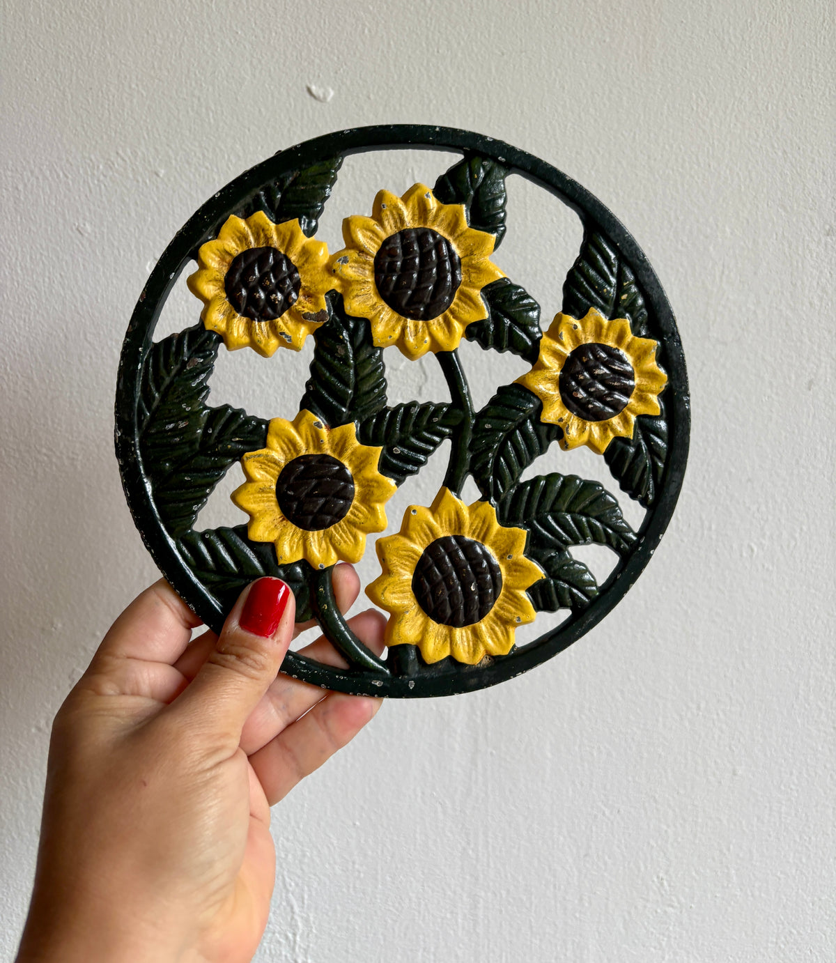 Dessous de plat vintage en fonte tournesol