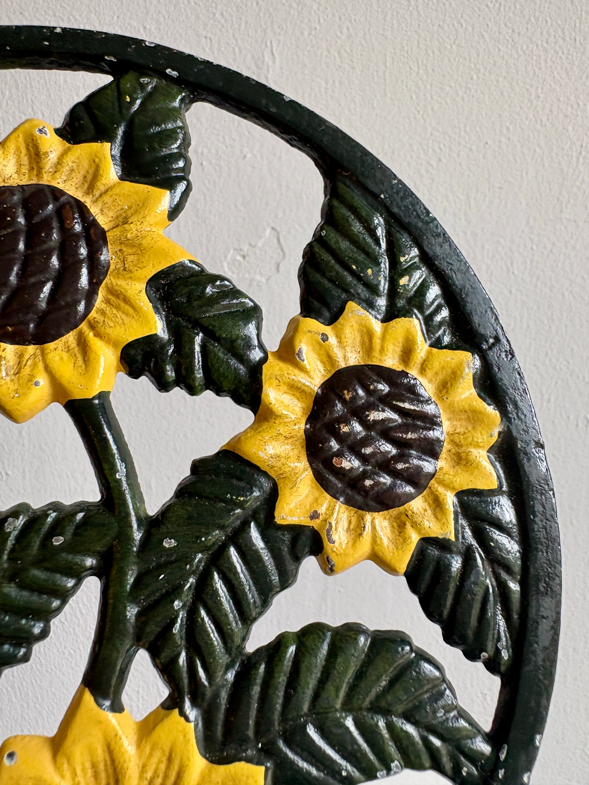 Dessous de plat vintage en fonte tournesol